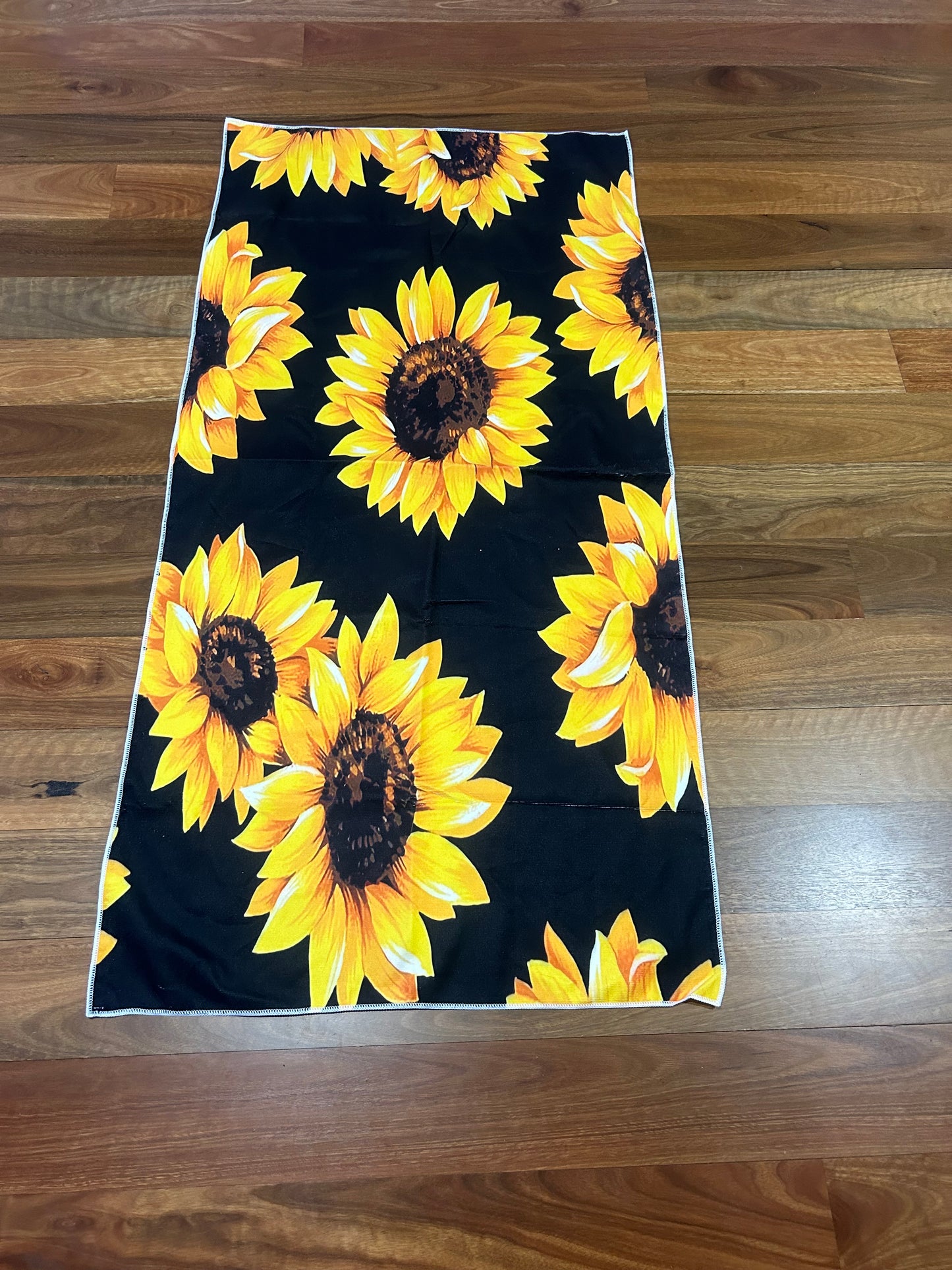 Sunny Escape: Quick Dry Black Beach Towel with Beautiful Yellow Sunflowers