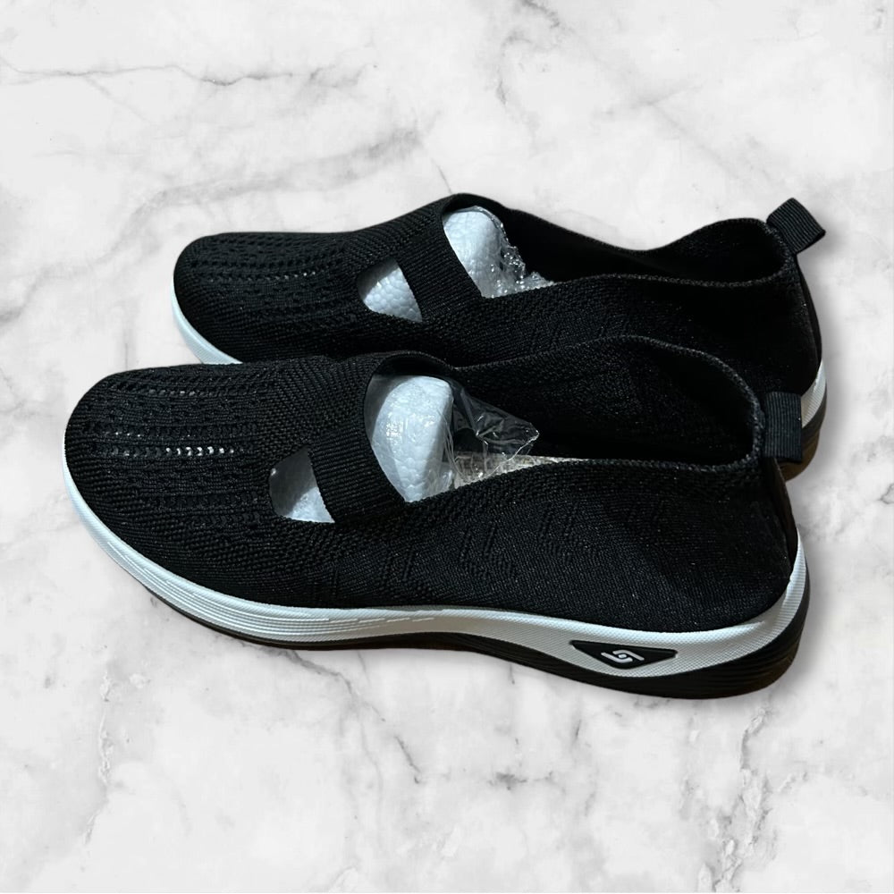 Summer Style: Women’s Black Cut-Out Sneakers with White Accents