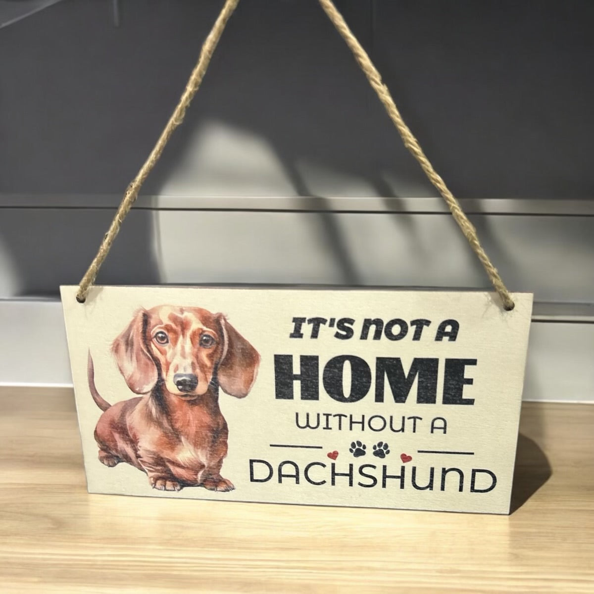 Heartwarming Hanging Sign: “It’s Not Home Without a Dachshund